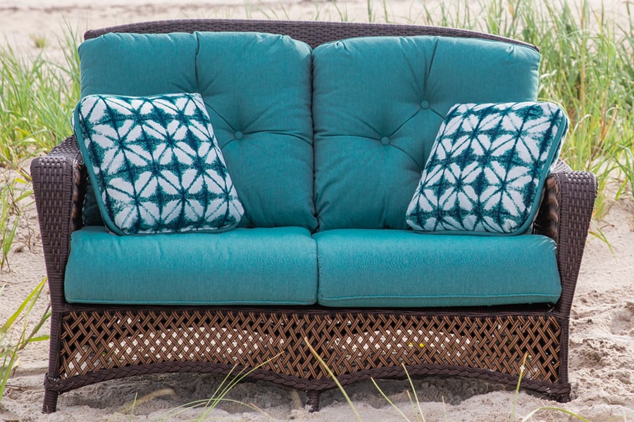 outdoor furniture with cushions on beach
